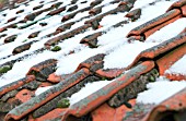 OLD PANTILE ROOF WITH SNOW