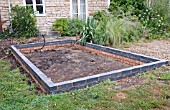 GREENHOUSE CONSTRUCTION AT WAKEFIELDS GARDEN, FOUNDATIONS BUILT.