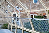 GREENHOUSE CONSTRUCTION AT WAKEFIELDS GARDEN, SHELVING.