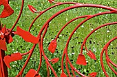 TERRA BOTANICA, GATES IN THE GENEROUS GARDEN MADE FROM RECYCLED IMPLEMENTS.