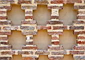 TERRA BOTANICA, OLD-STYLE DECORATIVE BRICK WALL IN TAMED GARDEN