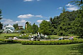 CAMBRIDGE UNIVERSITY BOTANIC GARDENS,  FOUNTAIN,  LAWN AND GLASSHOUSE