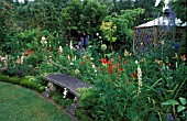 STONE SEAT IN FLOWER BED THE CROSSING HOUSE CAMBRIDGESHIRE