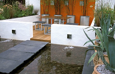 MODERN_PATIO_AND_POOL__URBAN_CALM_DESIGN_P_WYNNIATT_HUSEY_AND_P_CLARKE_HAMPTON_COURT