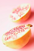 Pomegranate, Punica granatum, Pink subject, Pink background.