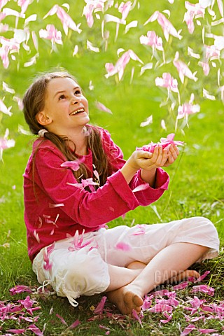 YOUNG_GIRL_CATCHING_PETALS