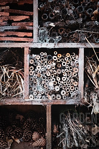 Garden_Insect_hotel_and_bug_refuge_made_from_roof_tiles_plant_cones_and__wood