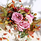 AUTUMNAL BOUQUET OF ROSES, ROSEHIPS AND LEAVES