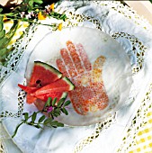 HENNA STENCIL UNDERNEATH A GLASS PLATE