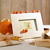 PICTURE FRAMES WITH PUMPKIN DECORATION
