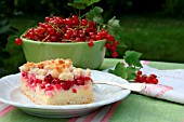 RED CURRANT CAKE AND A BOWL OF RED CURRANTS