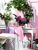 FLOWERY DECORATED BALCONY WITH A CLIMBING ROSE