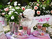 FLOWERY DECORATED BALCONY WITH A BUST