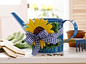 WATERING CAN DECORATED WITH A SUNFLOWER