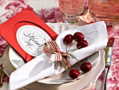 NAPKINS  CHERRIES AND A MENU CARD