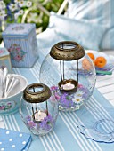 TABLE LANTERNS WITH FLOWERS