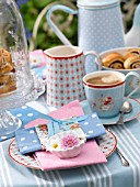 COFFEE PLACE SETTING DECORATED WITH FLOWERS