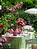 GARDEN TABLE EMBELLISHED WITH ROSES