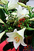 BOUQUET OF LILIES WITH MINIATURE ROSE HIPS