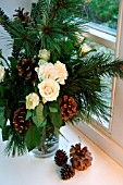 WINTRY BOUQUET ON A WINDOW LEDGE