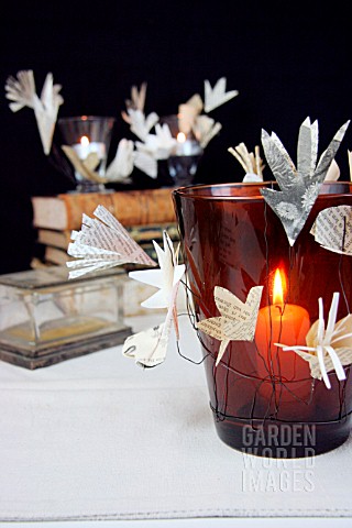 CANDLE_HOLDERS_DECORATED_WITH_PAPER_BLOSSOMS