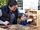 INSECT HOUSE BUILDING PROJECT WITH FATHER AND SON.  STEP 26