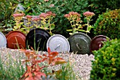 DECORATIVE EDGING USING LIDS FROM COOKING POTS