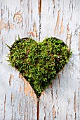 HEART CUT OUT IN OLD WOODEN DOOR