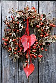 A LOOSELY BOUND ROSEHIP WREATH