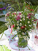 UPCYCLING OLD JAM JARS, FLOWERS PLACED IN JAR