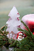 A TABLE IN THE GARDEN DECORATED FOR CHRISTMAS