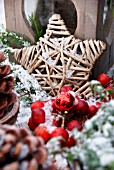 A TABLE IN THE GARDEN DECORATED FOR CHRISTMAS