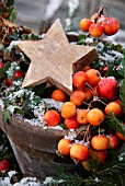 A TABLE IN THE GARDEN DECORATED FOR CHRISTMAS