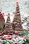 A TABLE IN THE GARDEN DECORATED FOR CHRISTMAS