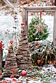 A TABLE IN THE GARDEN DECORATED FOR CHRISTMAS