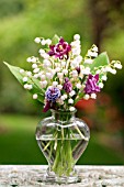 CONVALLARIA MAJALIS, AND AGUILEGIA IN GLASS VASE