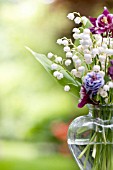 CONVALLARIA MAJALIS, AND AGUILEGIA IN GLASS VASE