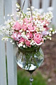 CONVALLARIA MAJALIS, ROSA, SYRINGA VULGARIS, HYACINTHOIDES HISPANICA IN HANGING VASE