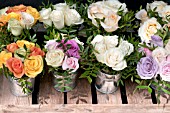 BOUQUETS OF ROSES IN ZINC CONTAINERS