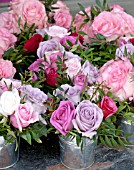 BOUQUETS OF ROSES IN ZINC CONTAINERS