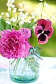 ROSA RUGOSA, CONVALLARIA MAJALIS AND PANSY IN JAR