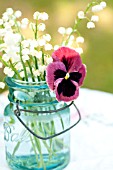 CONVALLARIA MAJALIS AND PANSY IN  JAR