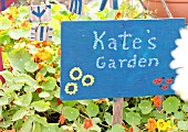 HAND WRITTEN SIGN IN ALLOTMENT GARDEN