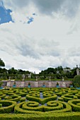 BUXUS SEMPERVIRENS AND TOPIARY IN FORMAL PARTERRE GARDEN AT CHATEAU DE BRECY
