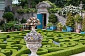 BUXUS SEMPERVIRENS AND TOPIARY IN FORMAL PARTERRE GARDEN WITH STONE URNS AND WOOD PLANTERS AT CHATEAU DE BRECY