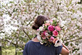 MALUS X EVERESTE  SPRING BOUQUET OF PINK ROSES  RANUNCULUS AND APPLE BLOSSOM