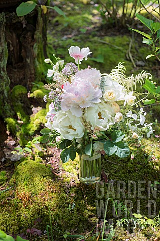 PAEONIA_LACTIFLORA_CHESTINE_GOUDY_AND_JAN_VAN_LEEUWEN_PEONIES_IN_BOUQUET_WITH_ROSES_AND_POPPIES_IN_W
