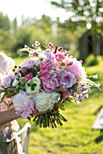 PAEONIA LACTIFLORA BOWL OF BEAUTY WITH ROSES, CARNATIONS, SCABIOSA AND SEED HEADS IN BOUQUET