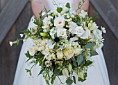 GREEN AND WHITE THEMED BRIDAL BOUQUET WITH ROSES, SCABIOSA, CARNATION, FERN, CLOVER AND WILDFLOWERS