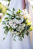 GREEN AND WHITE THEMED BRIDAL BOUQUET WITH ROSES, SCABIOSA, CARNATION, FERN, CLOVER AND WILDFLOWERS